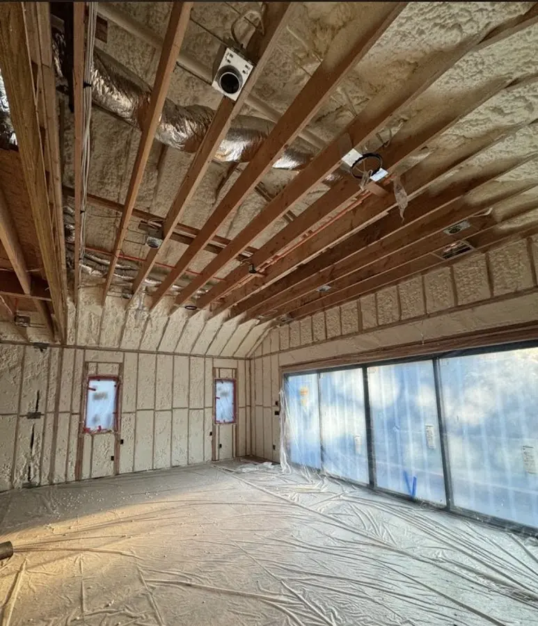 Interior walls and ceiling insulated with spray foam during new construction in Draper